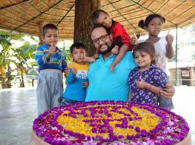 Bal Bahadur Bista with children in the care of Sahara Ghar